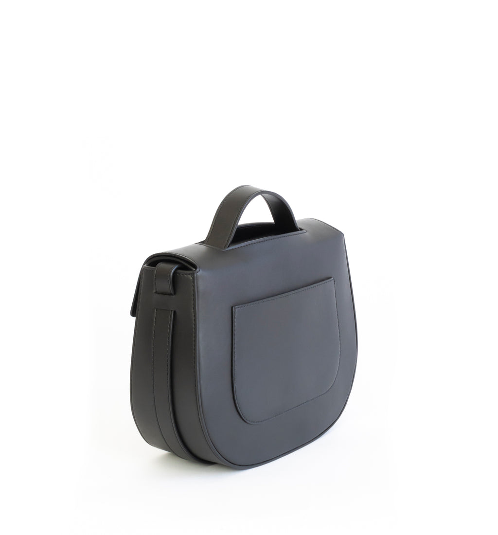 Eco vegan leather crossbody bag by Sydney Brown. Timeless, classic and modern. Back Angle view