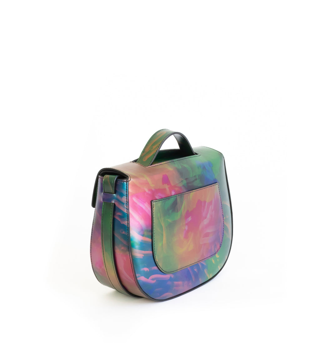 Printed iridescent vegan leather crossbody bag by Sydney Brown. Timeless, classic and modern.  Angle Back view.