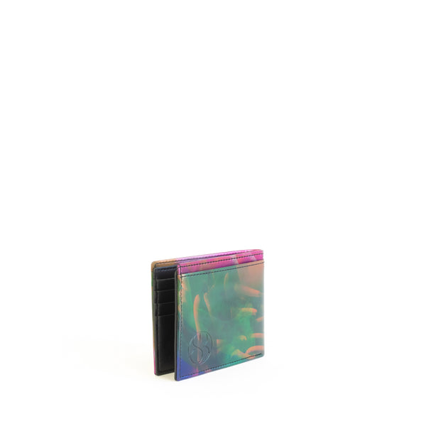 Unisex bifold wallet, practical and timeless. Iridescent print faux-leather. Angle