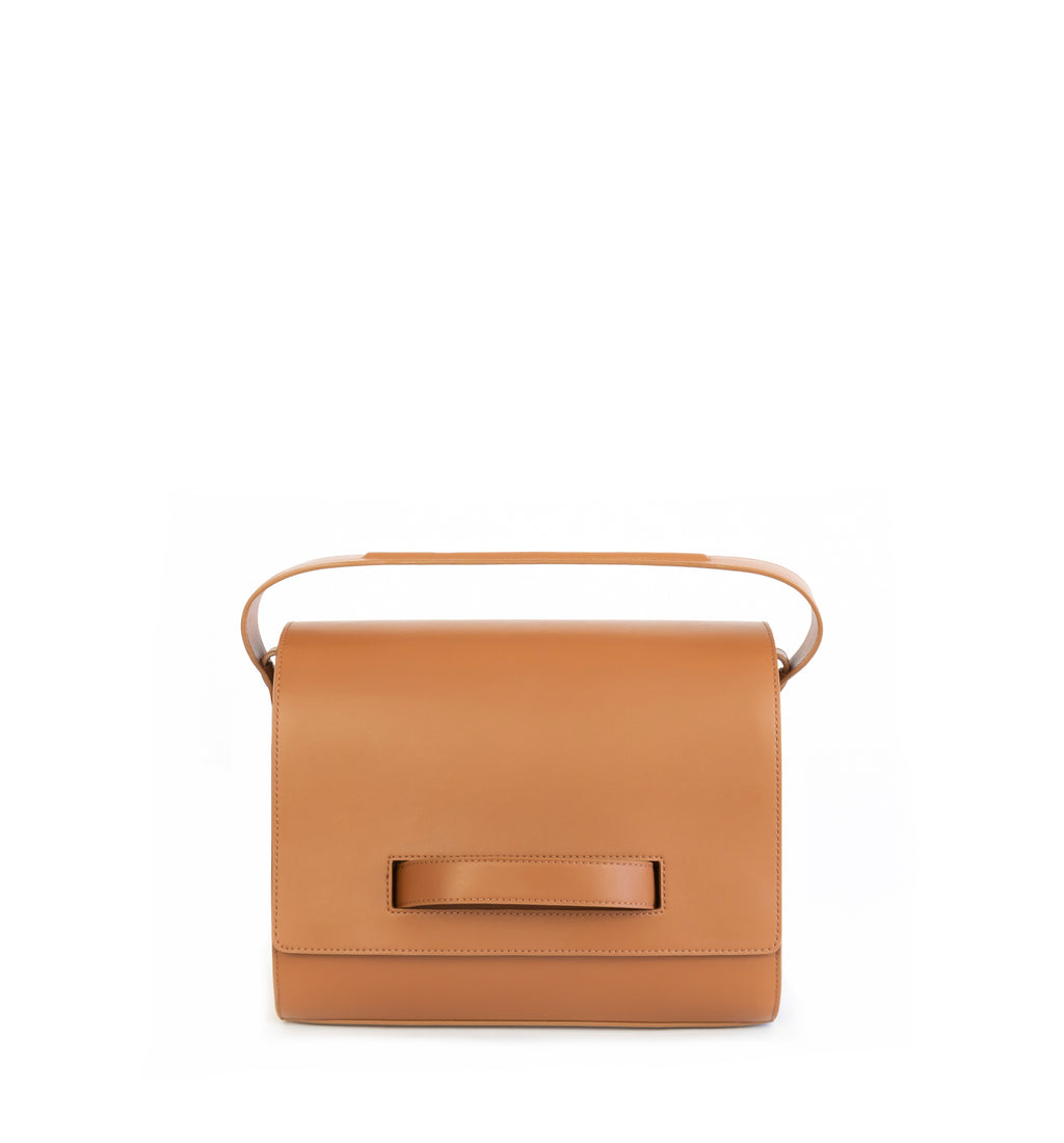 Brown eco vegan leather barrel shoulder bag by Sydney Brown. Timeless, classic and modern. Front View