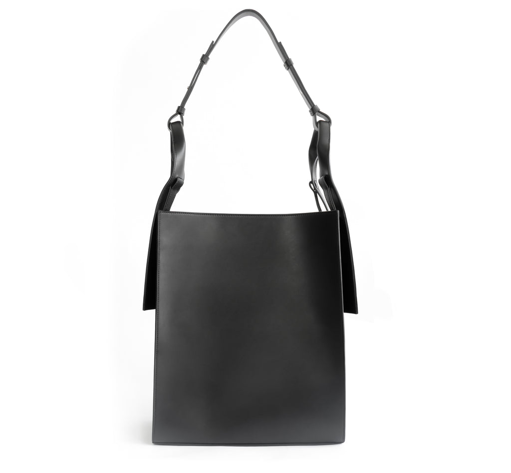 Black eco vegan leather tote shoulder bag by Sydney Brown. Timeless, classic and modern.  Front View.