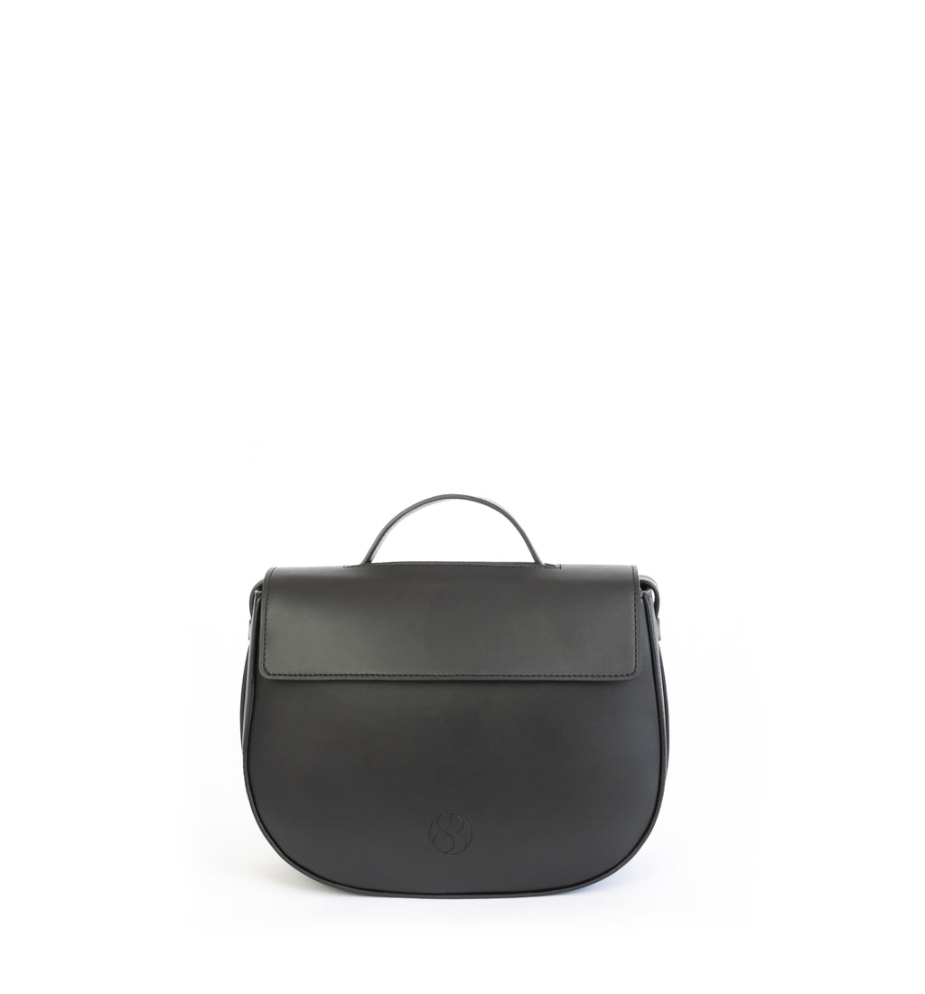 Eco vegan leather crossbody bag by Sydney Brown. Timeless, classic and modern. Front view