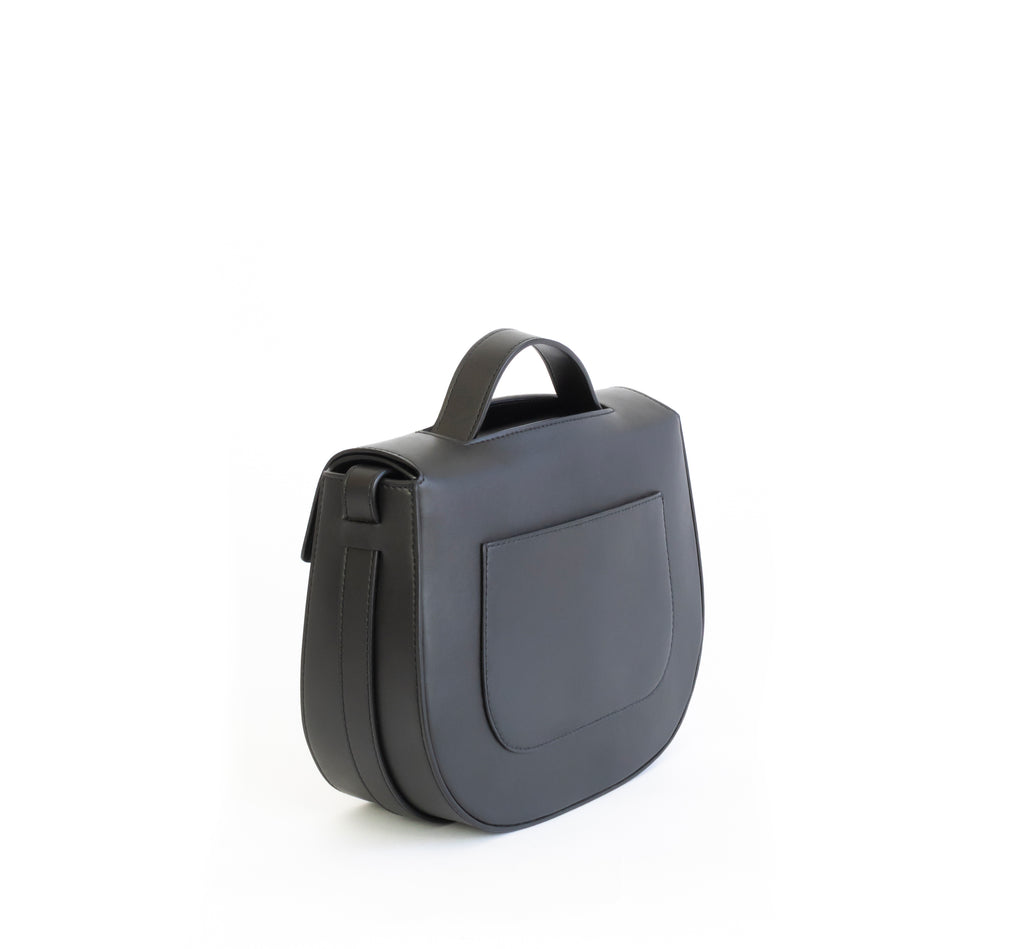 Eco vegan leather crossbody bag by Sydney Brown. Timeless, classic and modern. Back Angle view
