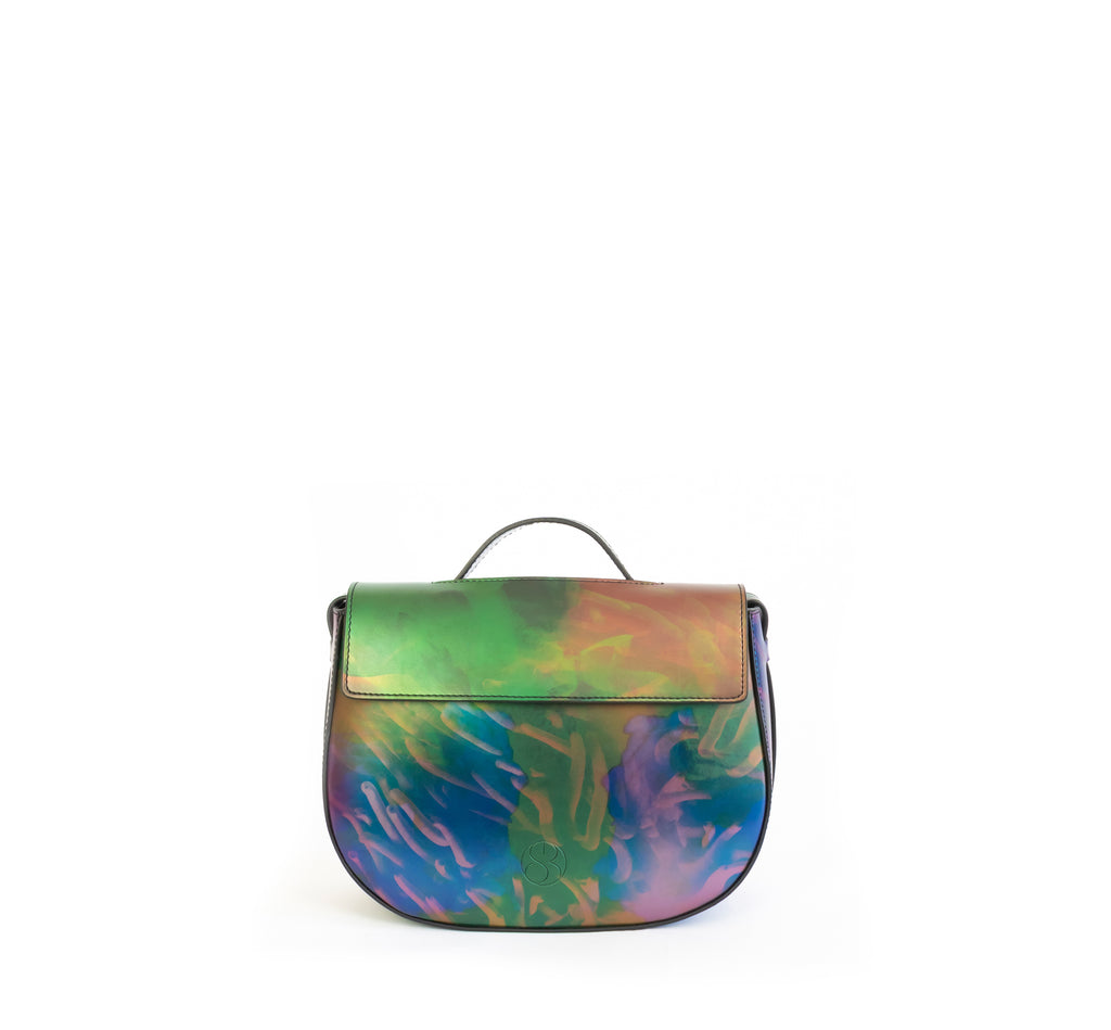 Printed iridescent vegan leather crossbody bag by Sydney Brown. Timeless, classic and modern. Front view.
