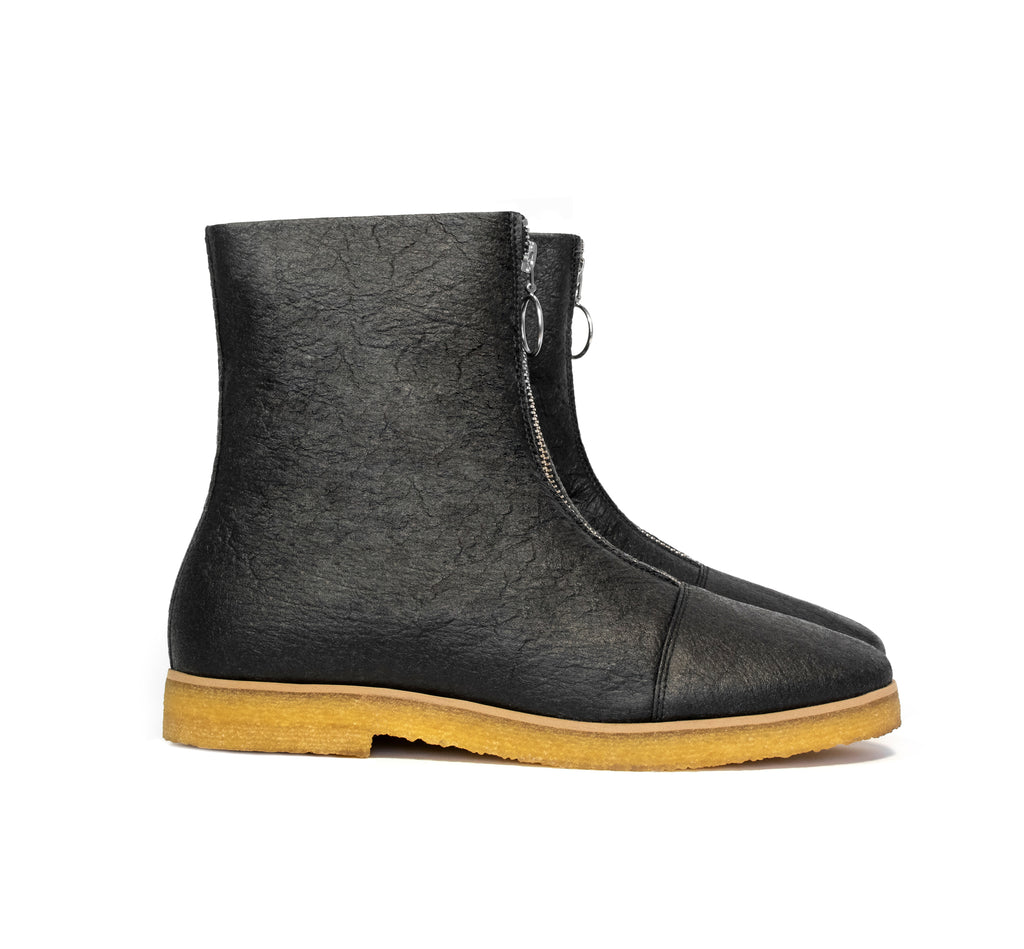 Boot in Black vegan pineapple leather alternative, pinatex, frontal zip, almond toe, natural rubber crepe sole.