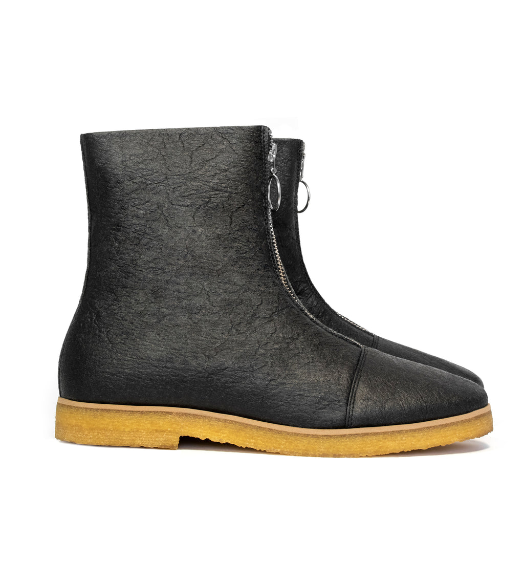 Boot in Black vegan pineapple leather alternative, pinatex, frontal zip, almond toe, natural rubber crepe sole.