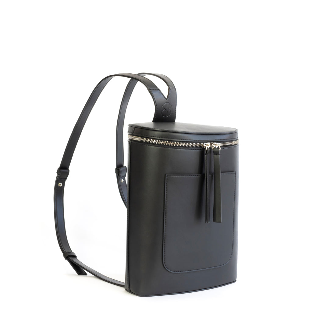 Black eco vegan leather bucket backpack by Sydney Brown. Timeless, classic and modern. Angle