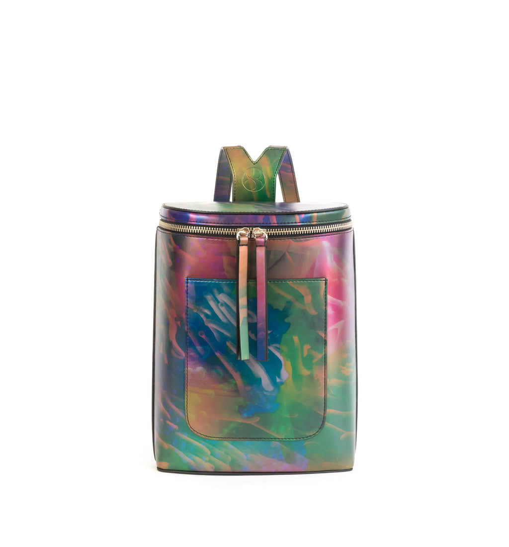 Printed iridescent vegan leather bucket backpack by Sydney Brown. Timeless, classic and modern. Front view.