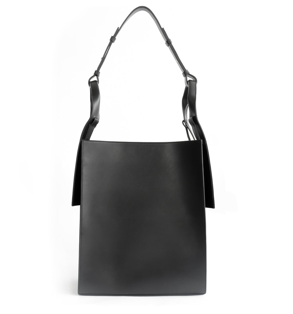Black eco vegan leather tote shoulder bag by Sydney Brown. Timeless, classic and modern.  Front View.