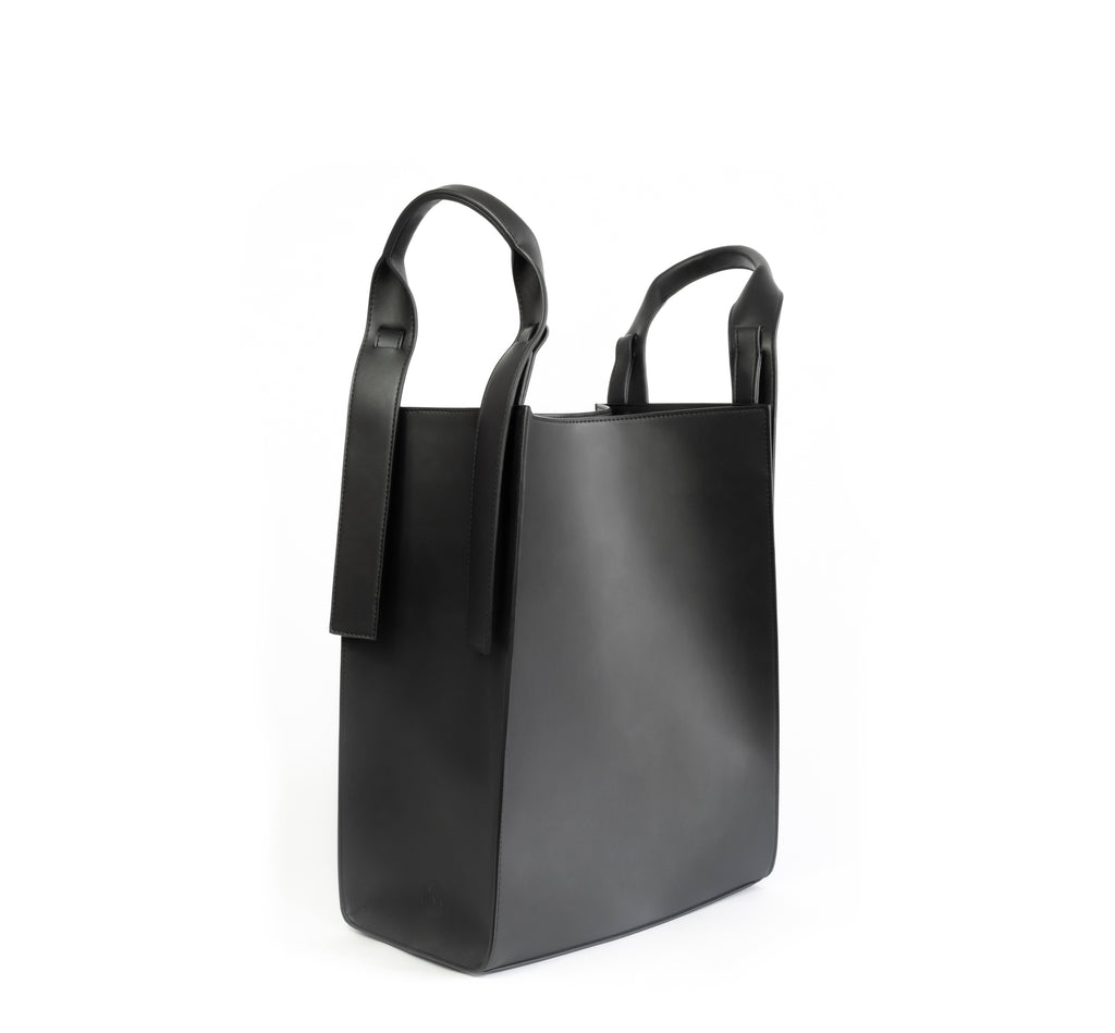 Black eco vegan leather tote shoulder bag by Sydney Brown. Timeless, classic and modern.  No shoulder handle.