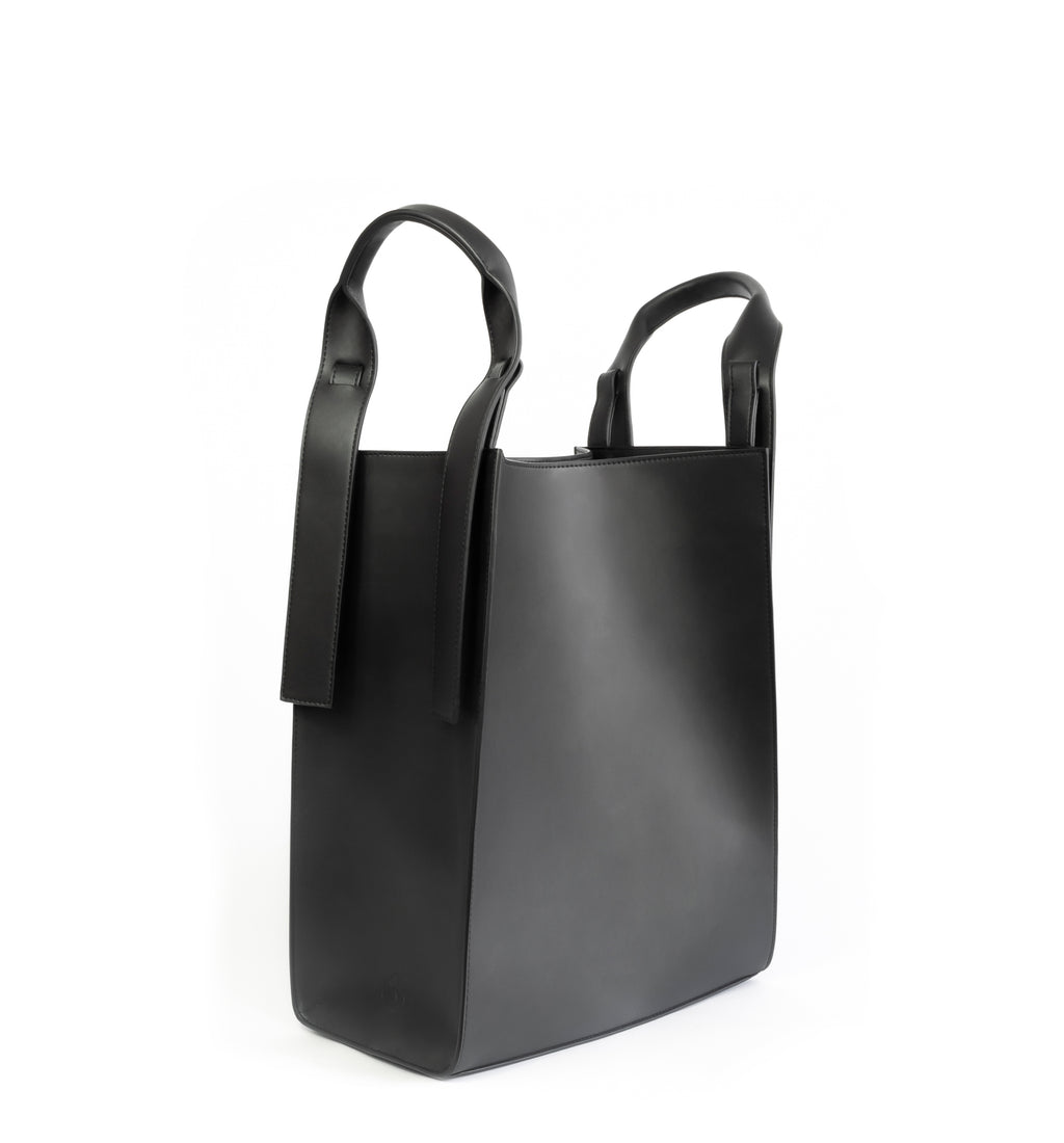 Black eco vegan leather tote shoulder bag by Sydney Brown. Timeless, classic and modern.  No shoulder handle.