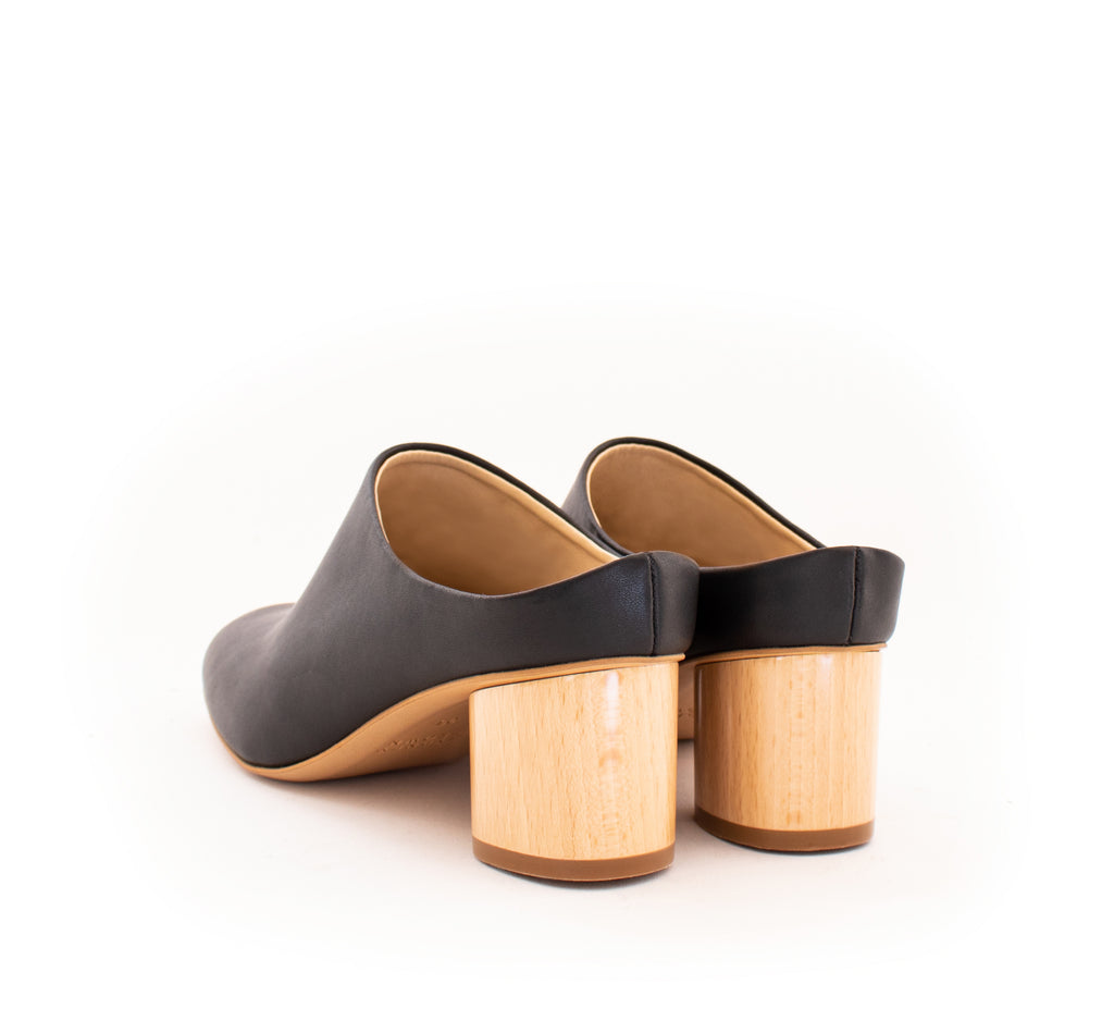 Mule in black eco vegan leather, almond toe with a natural wood mid-heel.