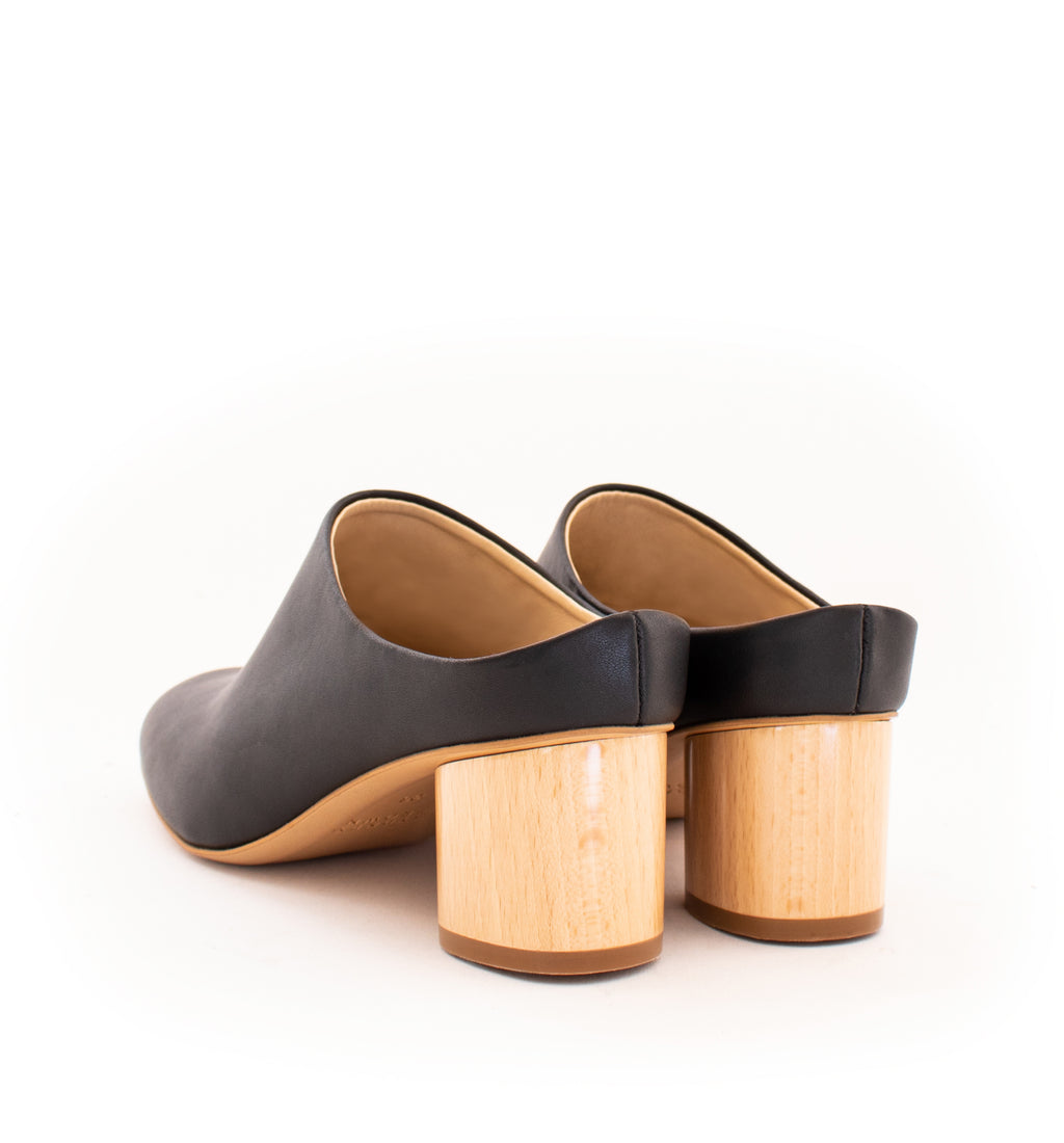 Mule in black eco vegan leather, almond toe with a natural wood mid-heel.