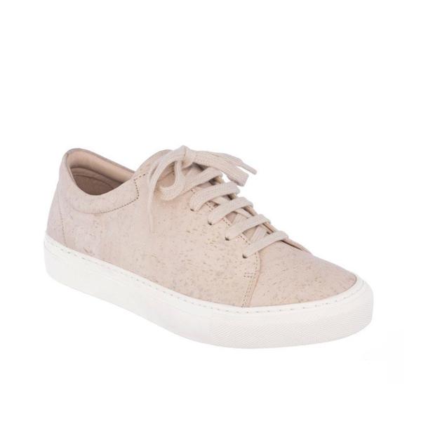 Low sneaker in beige cork with a white rubber sole.